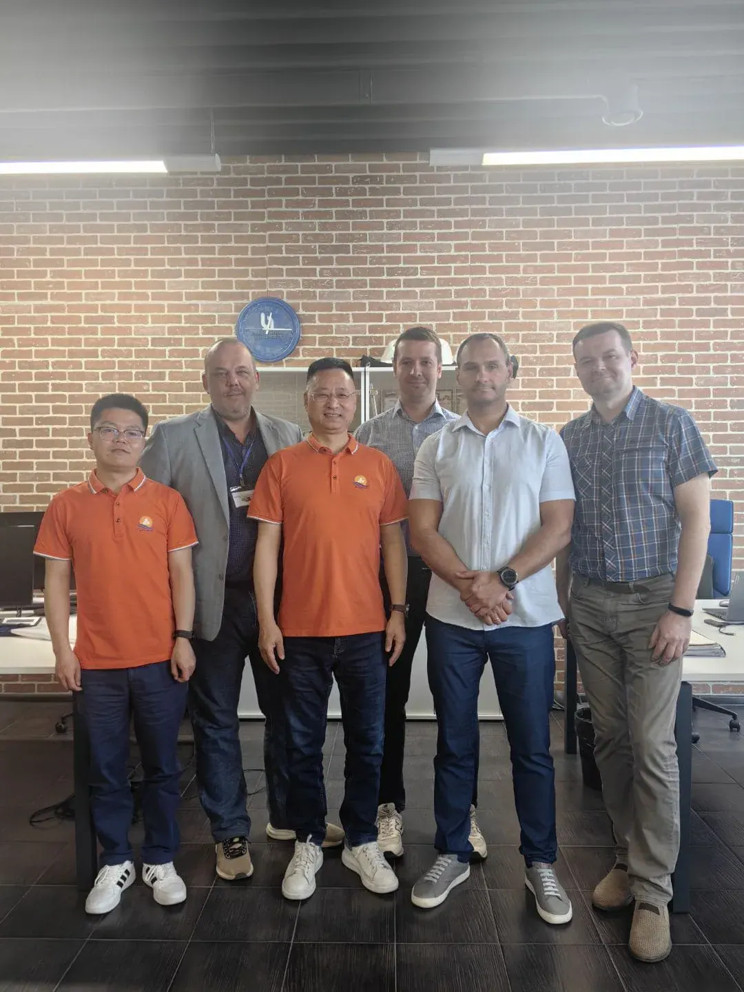 Customer and workshop team photograph