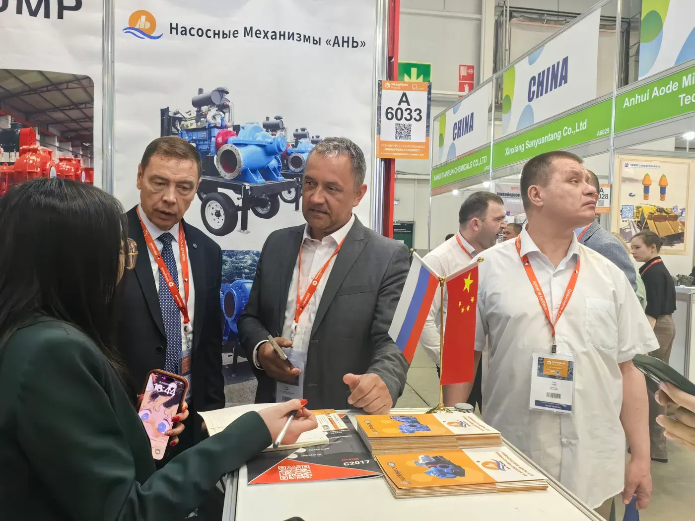 Reviewing pump brochures with visitors