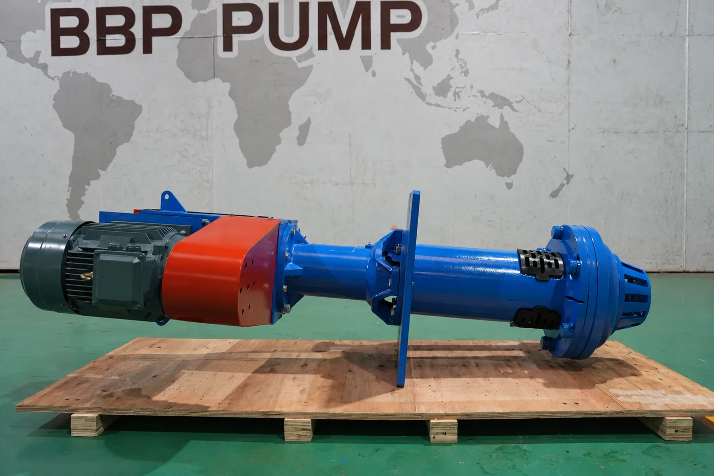 Illustration of a vertical sump slurry pump laid horizontally on a pallet with its motor attached